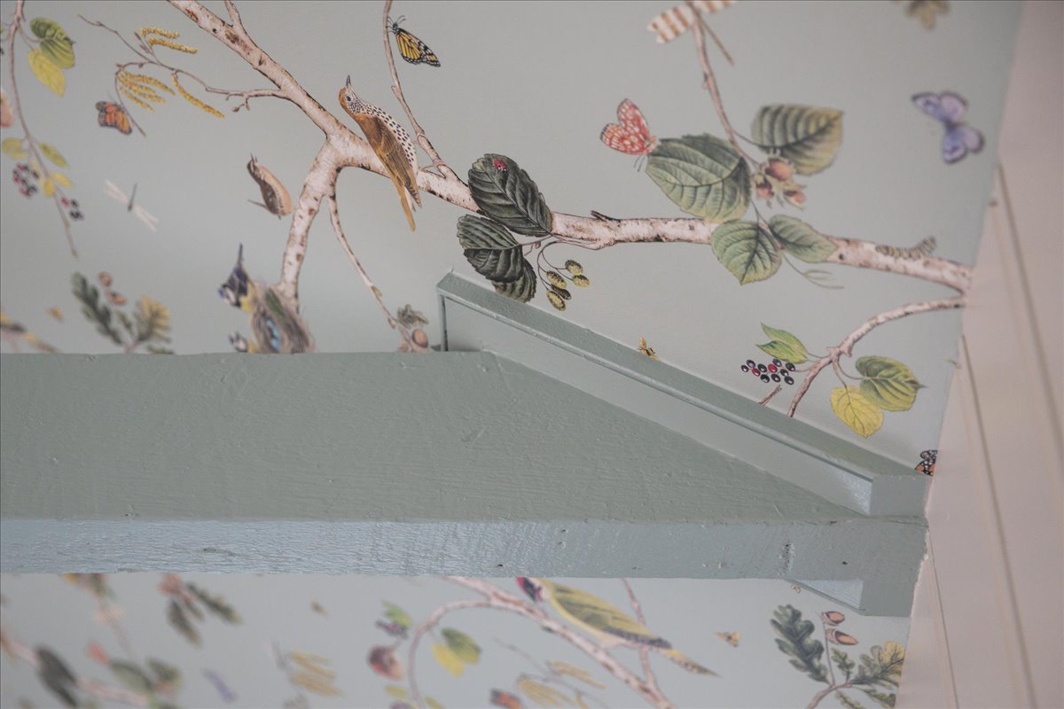 Painted beams and patterned ceiling planes