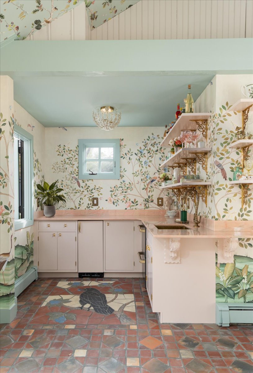 Kitchenette with layered finishes, shelves, cabinetry, and tile floor