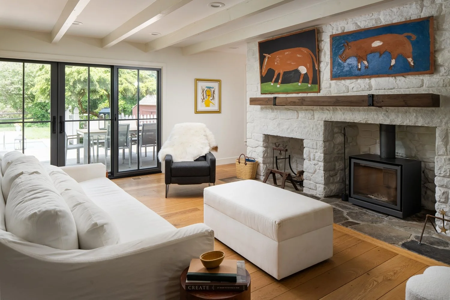 Quiet living room detail with tailored furniture and art
