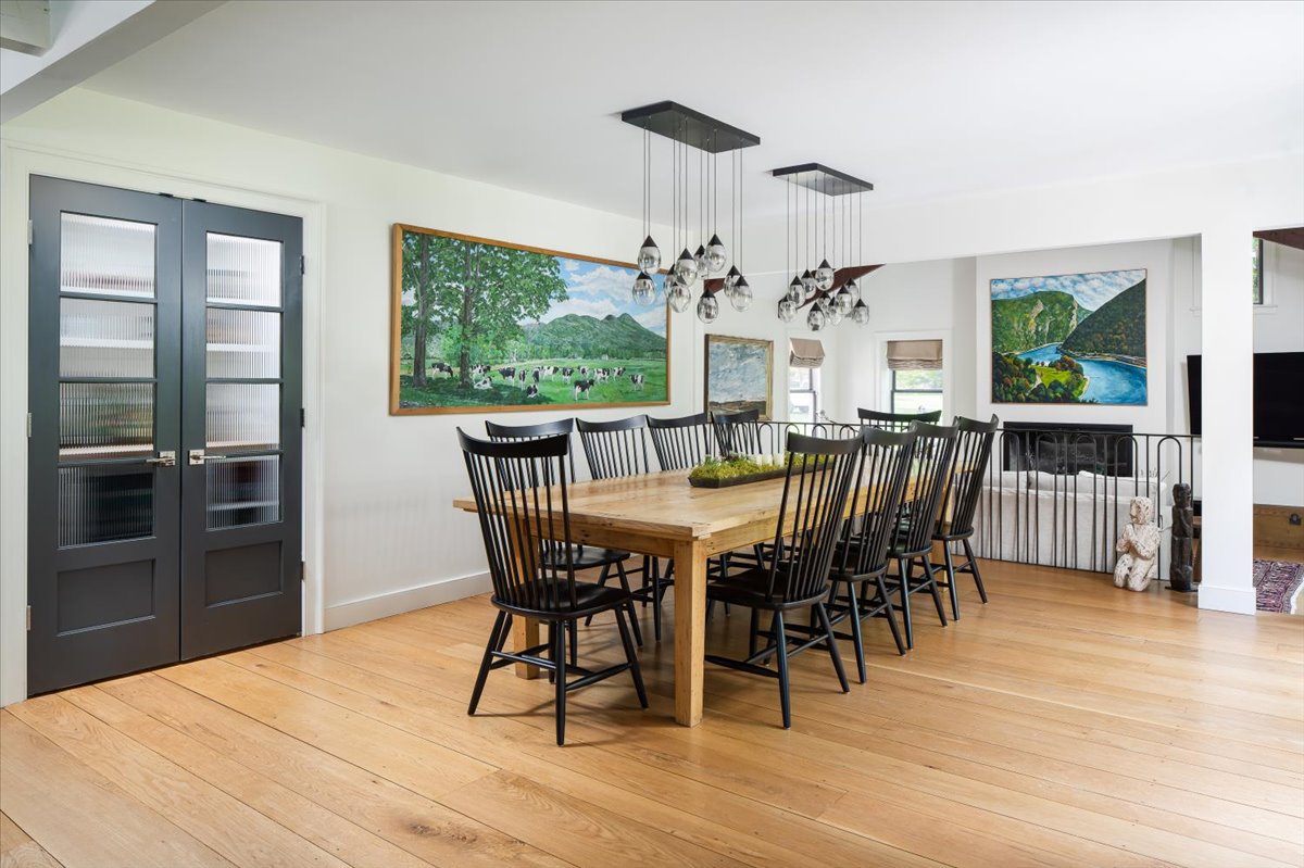 Gallery House seating area with soft upholstery and refined finishes
